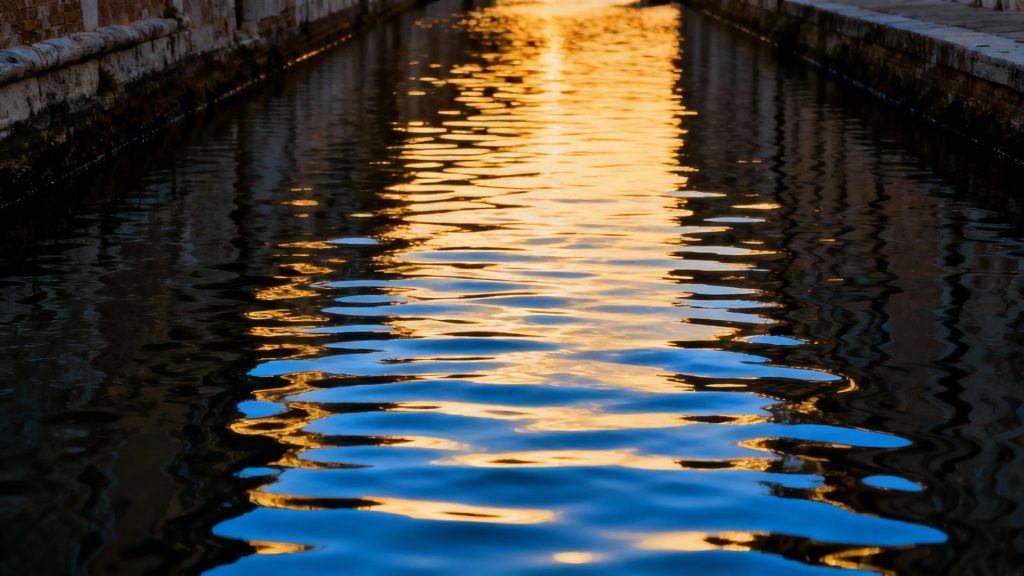 The Canal's Whisper: Where Time Dissolves in Ripples of Azure and Gold